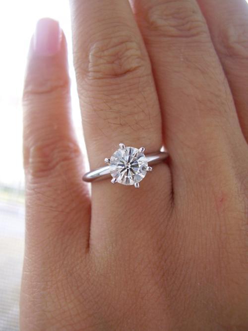 2 carat ring on store size 4 finger